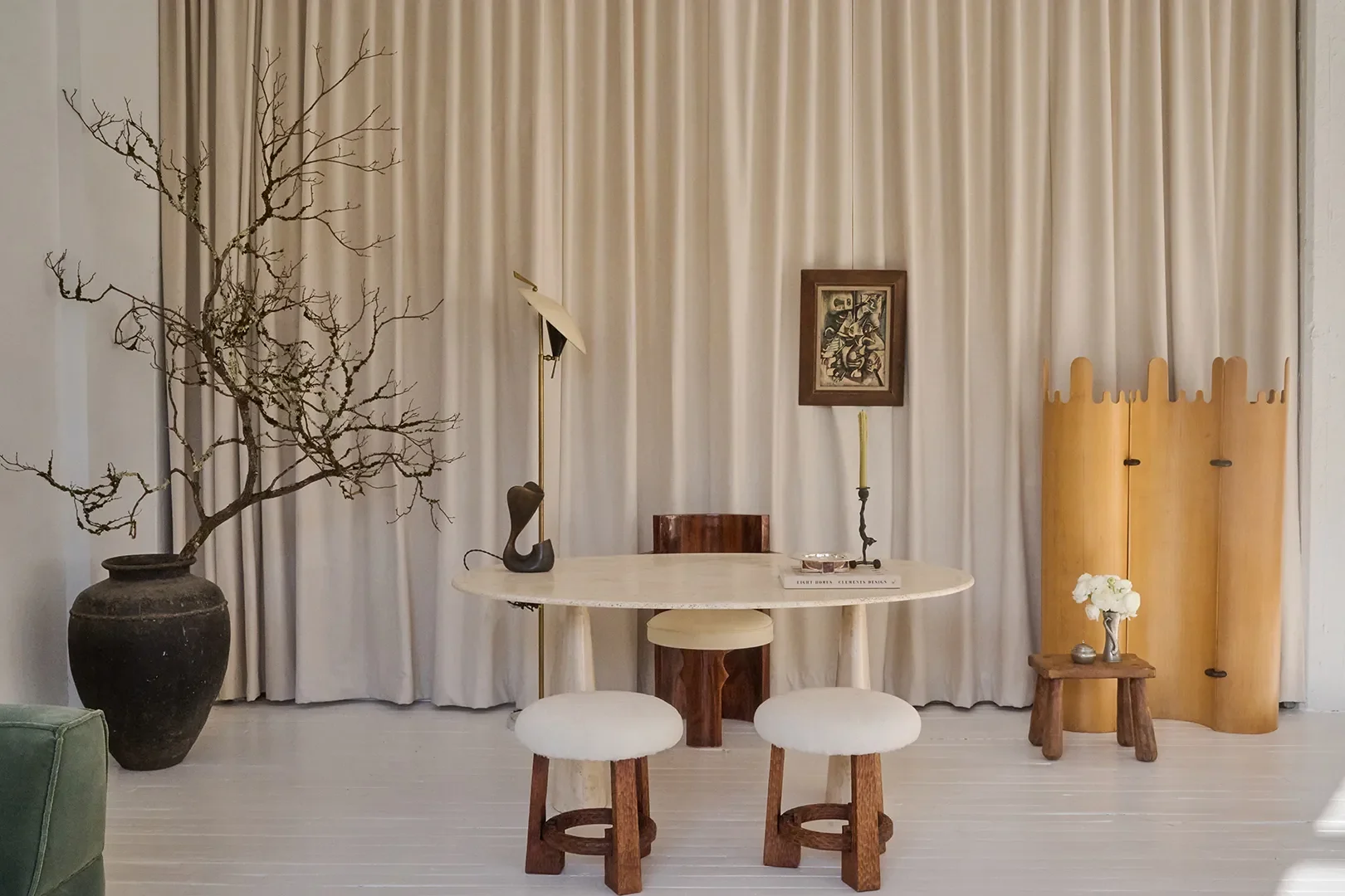 workspace with oval table and stools