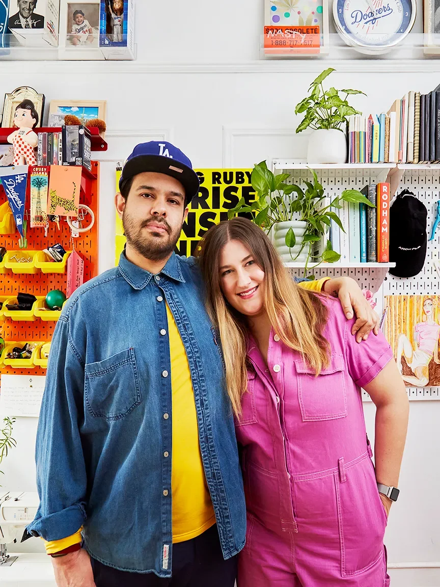 Couple standing in office