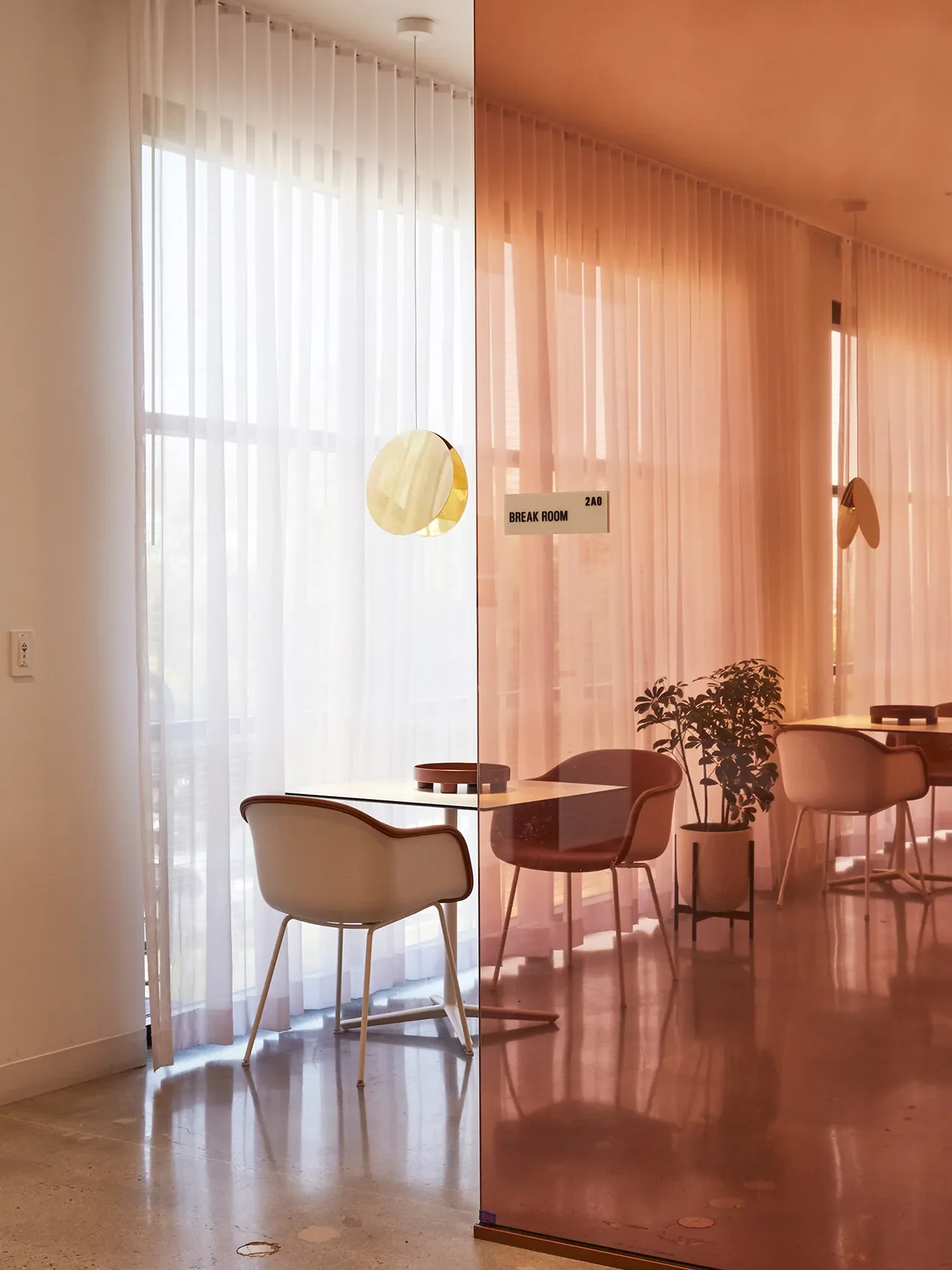 LT05 North Pendant Light by Eva Marguerre and Marcel Besau,Northern Icon; Fiber Armchairs by Iskos-Berlin for Muuto,Lumens; Quattro Tables by Lievore Altherr Molina,Andreu World.